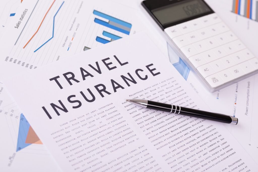 travel insurance concept, documents on the desktop