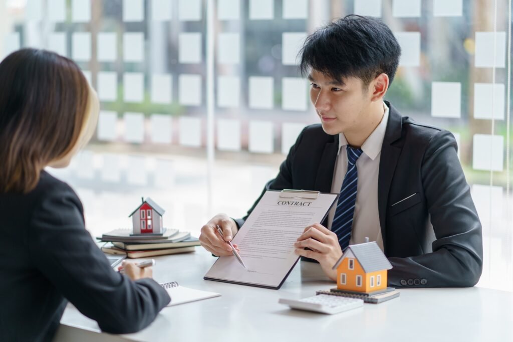 Real estate agent and customer enter into contracts for the sale of houses and land