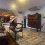 Interior view of an elegant living room with Asian-inspired decor.