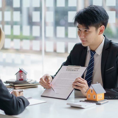 Real estate agent and customer enter into contracts for the sale of houses and land